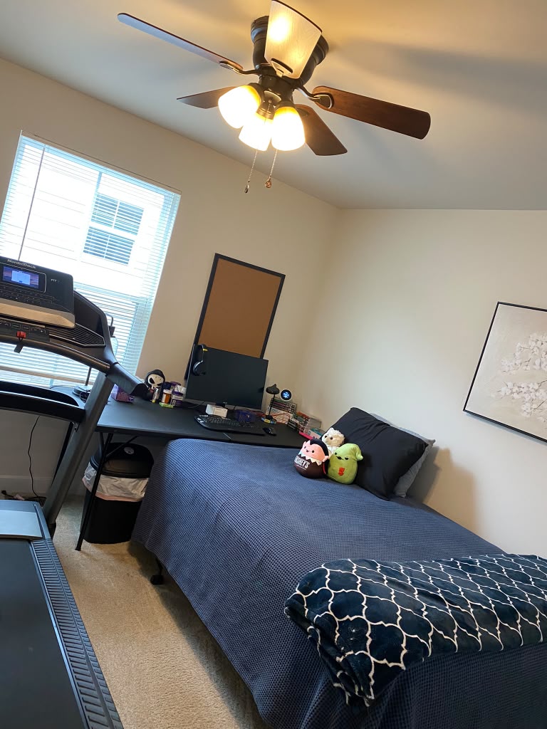 Bedroom desk and workout corner freshly cleaned and organized