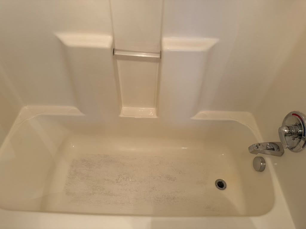 Same bathtub spotless after a move-in/move-out service in Richmond, VA